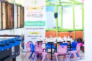 فقرة رسم الوجوه للأطفال في اليوم العالمي للطفولة بمركز الأمل